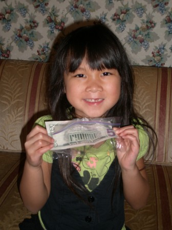 Kasen with Tooth Fairy money